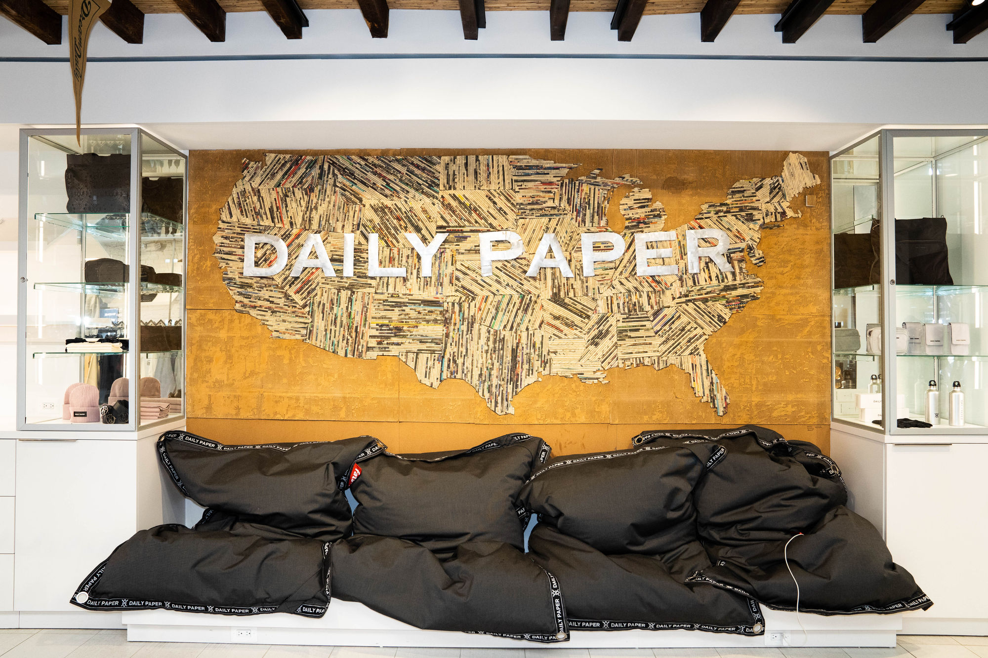 A newspaper-collage map of the United States on the wall of Daily Paper’s New York flagship