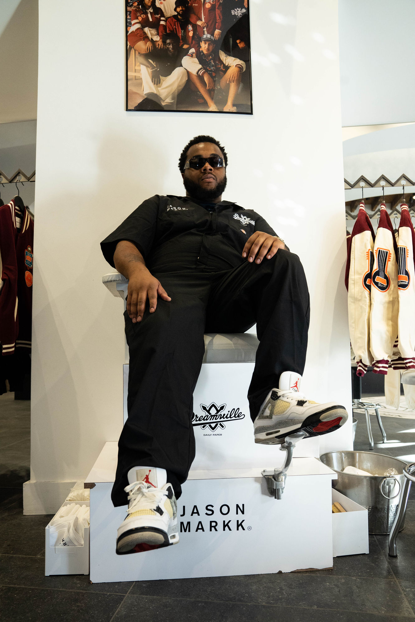 A guest posing in the Jason Markk shoeshine chair at the Dream Daily launch