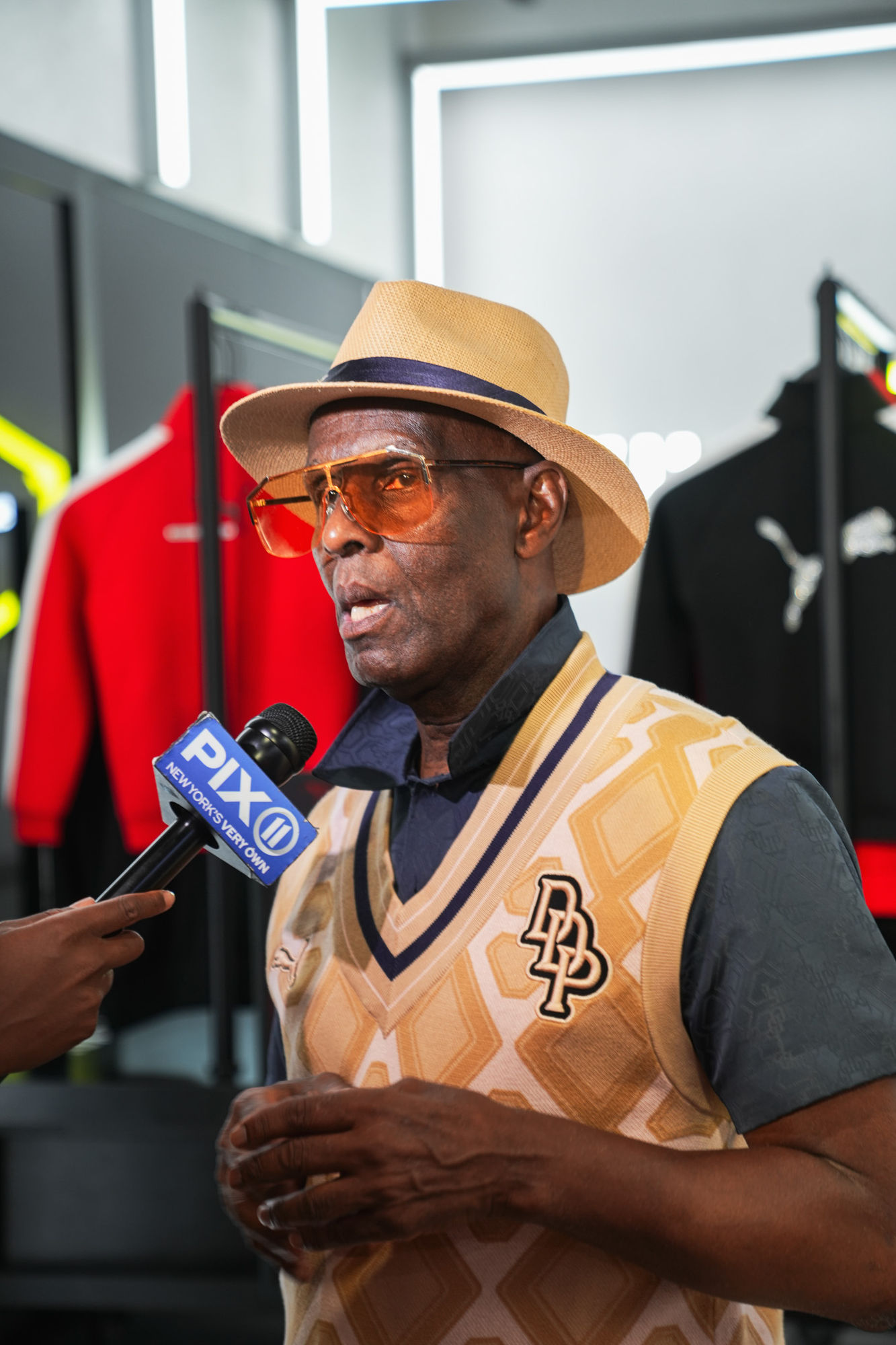 Dapper Dan interviewed on camera for PIX11 News at the PUMA launch